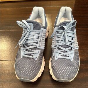 On Running Athletic Shoes in Blue and White